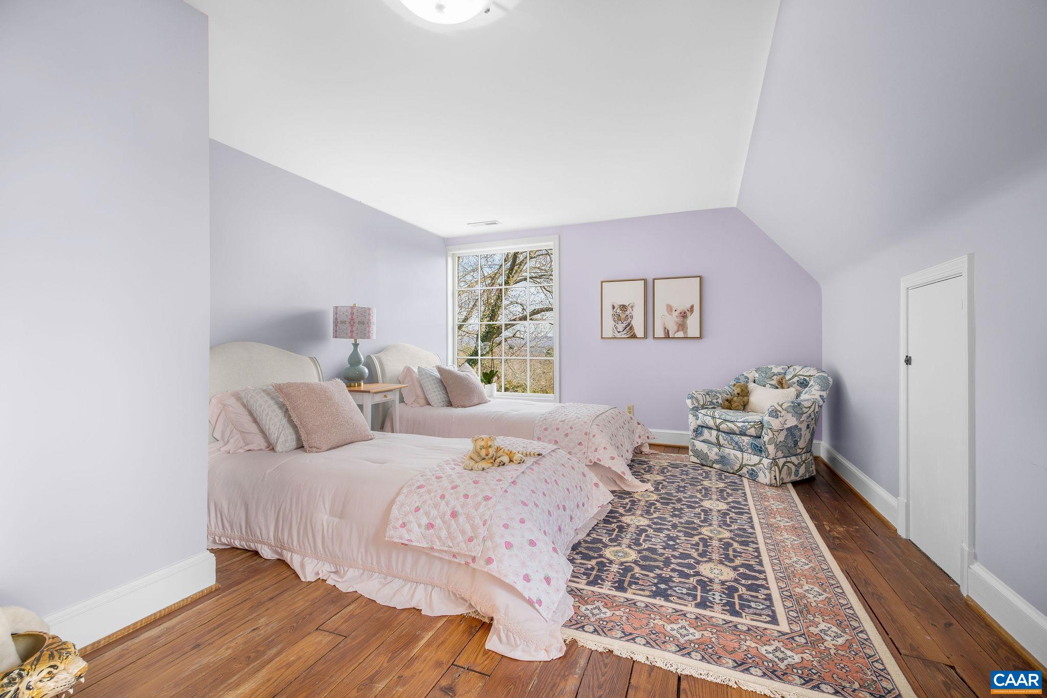 2418 Northfield Road Charlottesville, VA 22901 - Photo 35 of 47 a bedroom with a bed and a couch