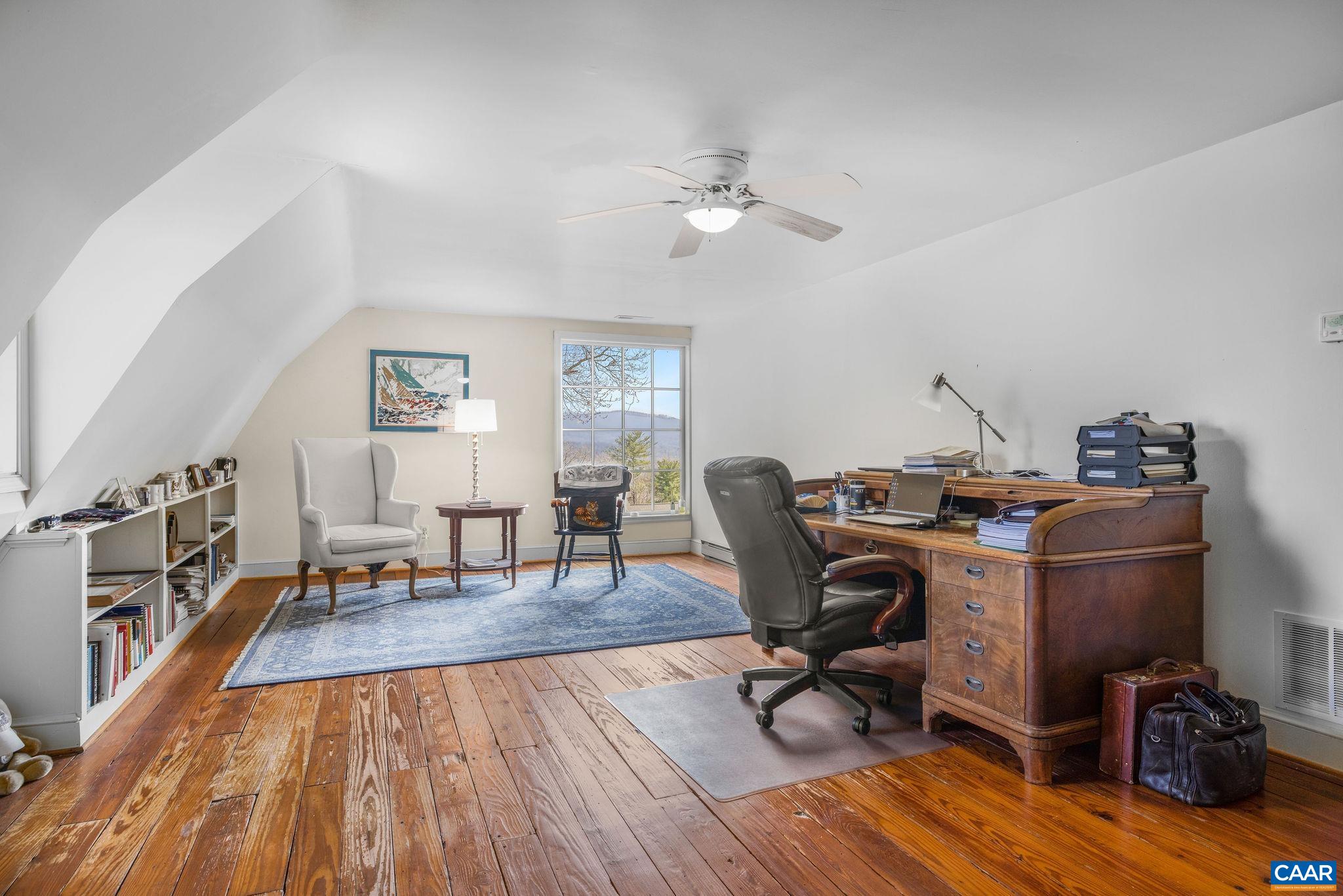 2418 Northfield Road Charlottesville, VA 22901 - Photo 37 of 47 a view of a workspace with furniture and a workspace