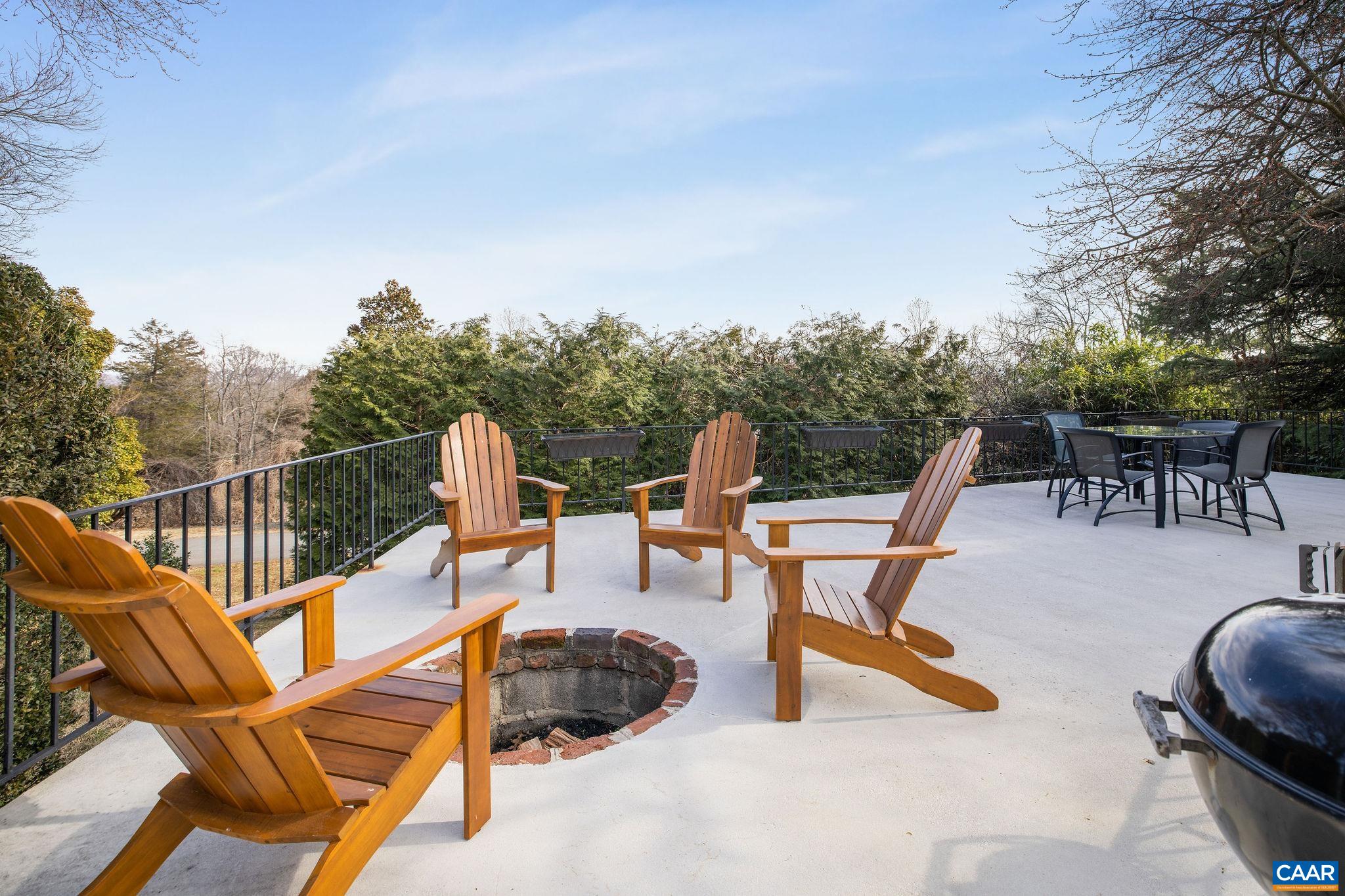 2418 Northfield Road Charlottesville, VA 22901 - Photo 38 of 47 a view of a chairs and tables in the roof deck