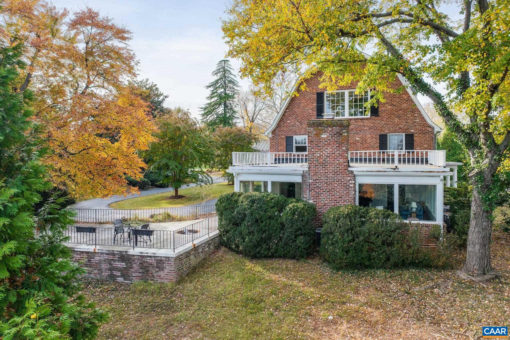 2418 Northfield Road Charlottesville, VA 22901 - Photo 46 of 47 a view of a house with a yard and large trees