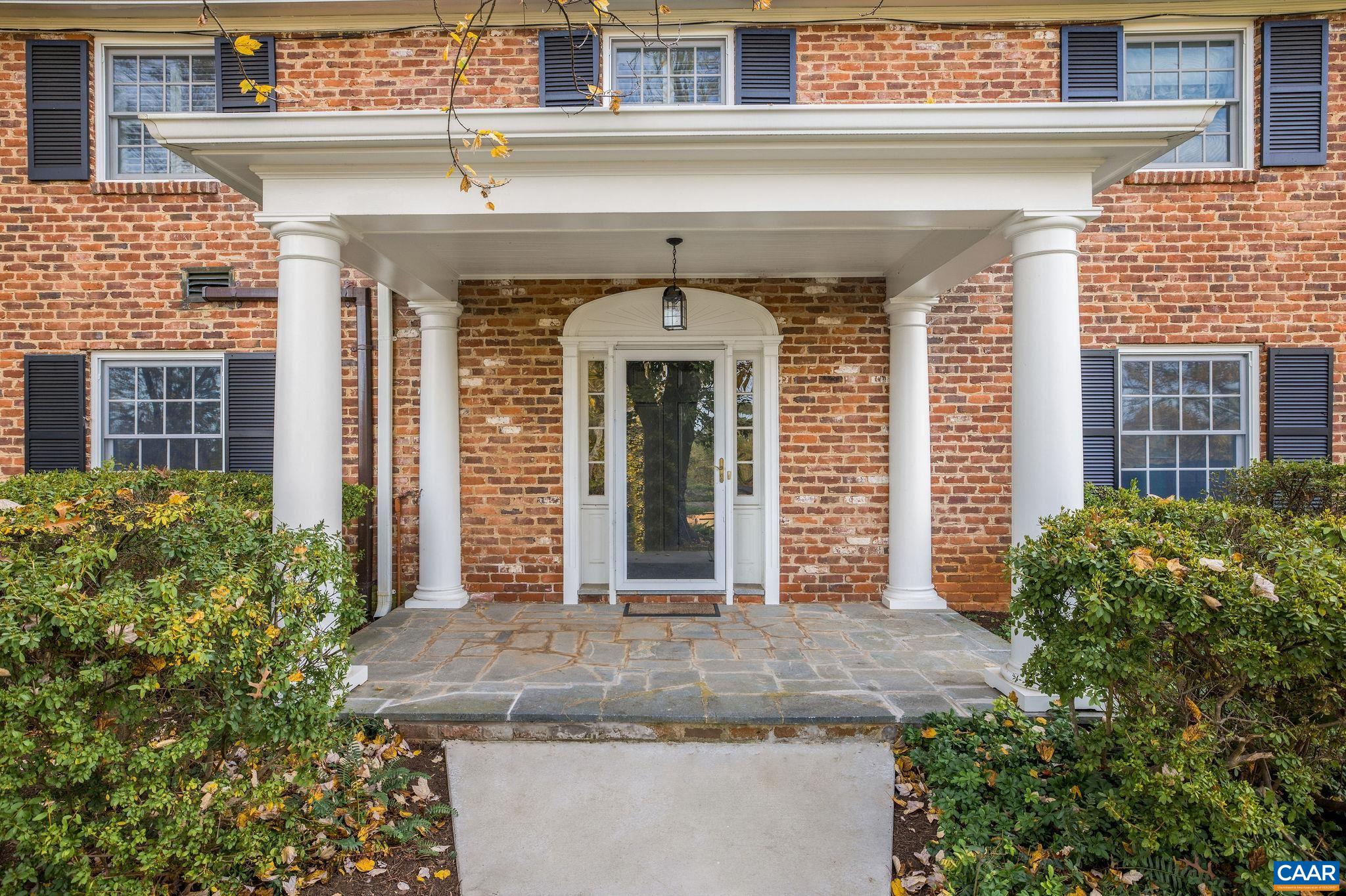 2418 Northfield Road Charlottesville, VA 22901 - Photo 5 of 47 a front view of a house with garden