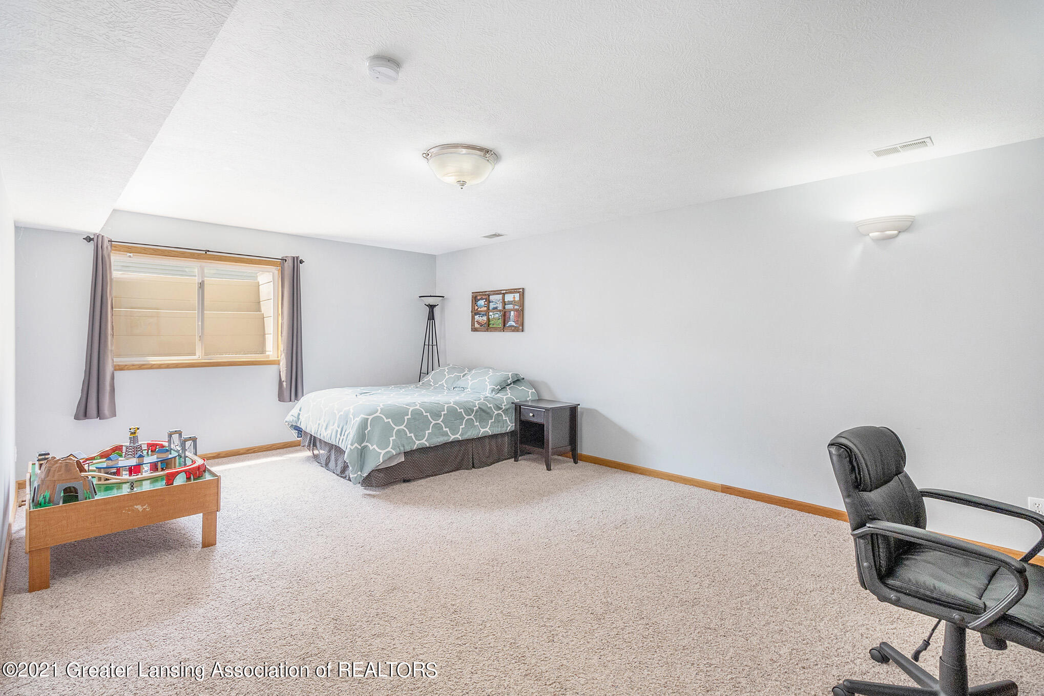 6360 Macadam Way Dimondale, MI 48821 - Photo 22 of 28 Lower level bedroom