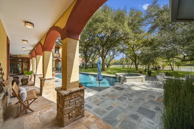 a view of a tables and chairs in a yard