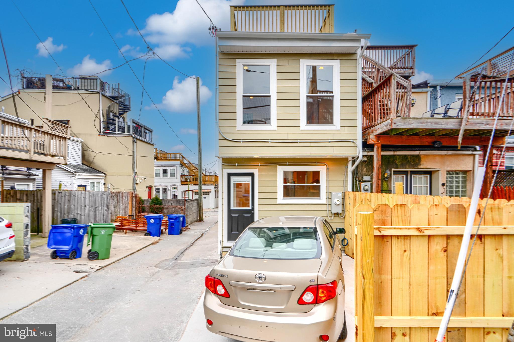 719 South Robinson Street Baltimore, MD 21224 - Photo 15 of 31 a street view of building with an entrance
