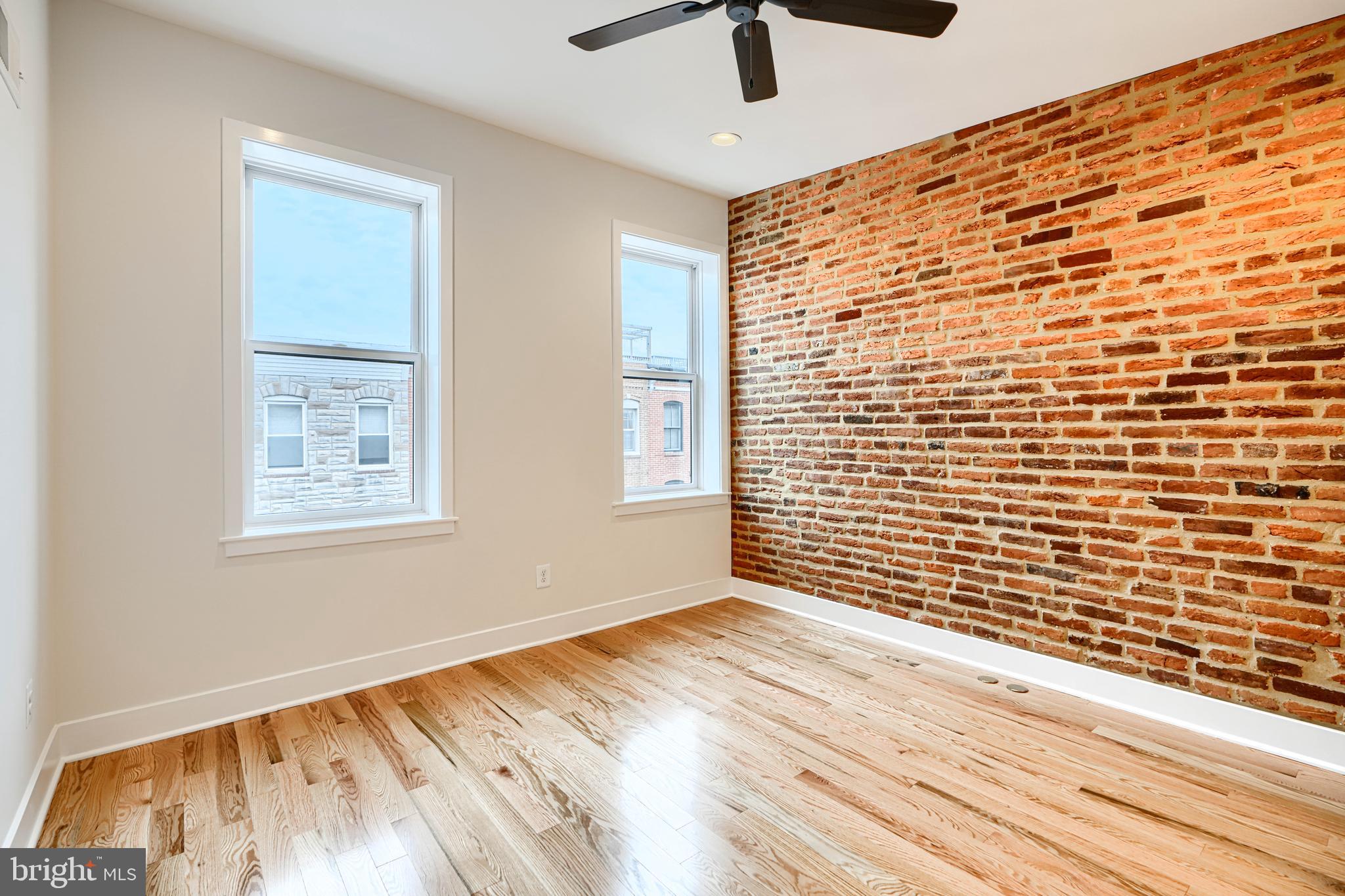719 South Robinson Street Baltimore, MD 21224 - Photo 19 of 31 a view of an empty room with a window