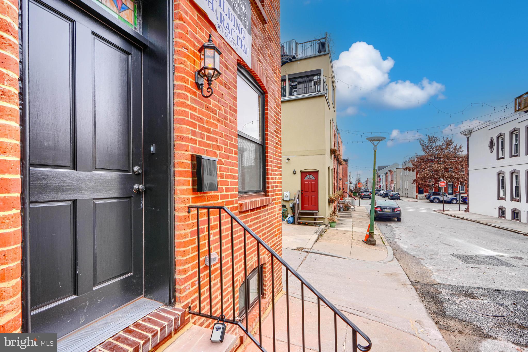 719 South Robinson Street Baltimore, MD 21224 - Photo 2 of 31 a view of a balcony with chairs