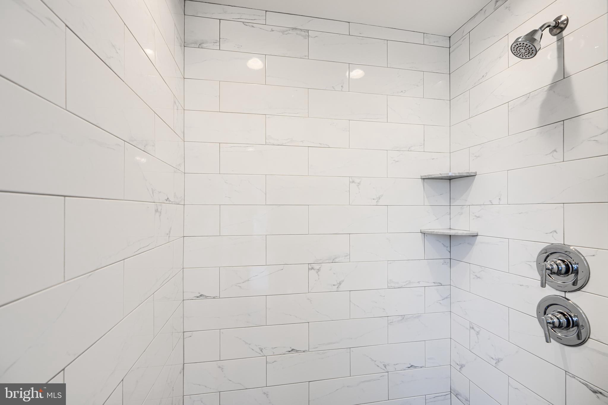 719 South Robinson Street Baltimore, MD 21224 - Photo 28 of 31 a bathroom with a shower