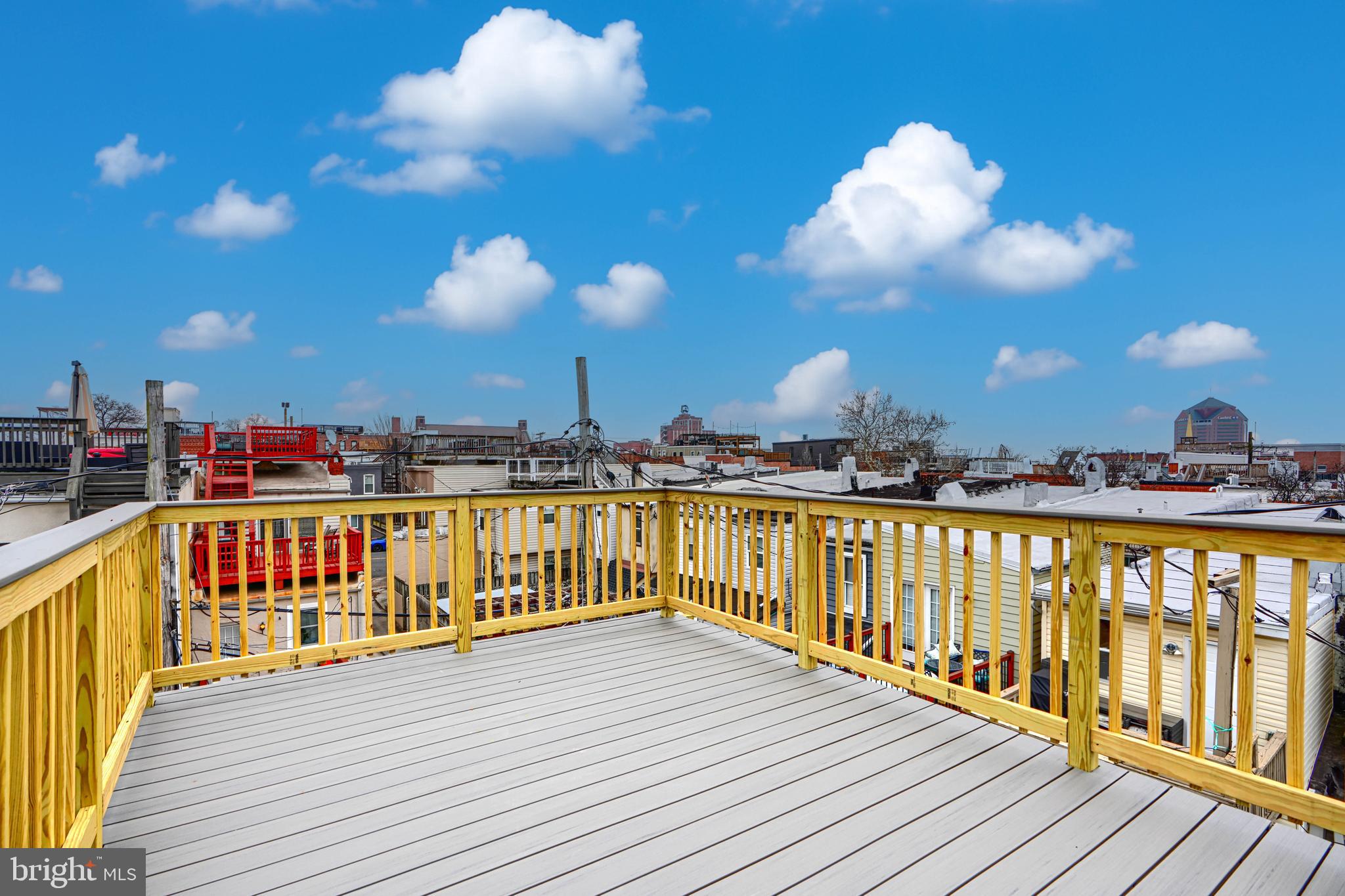 719 South Robinson Street Baltimore, MD 21224 - Photo 29 of 31 a view of a balcony with wooden floor