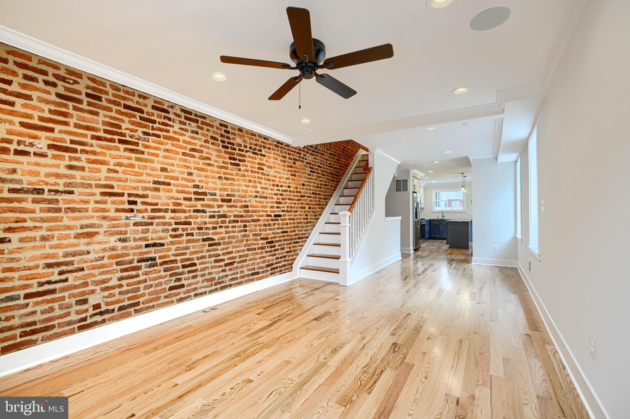 719 South Robinson Street Baltimore, MD 21224 - Photo 3 of 31 a view of empty room with wooden floor