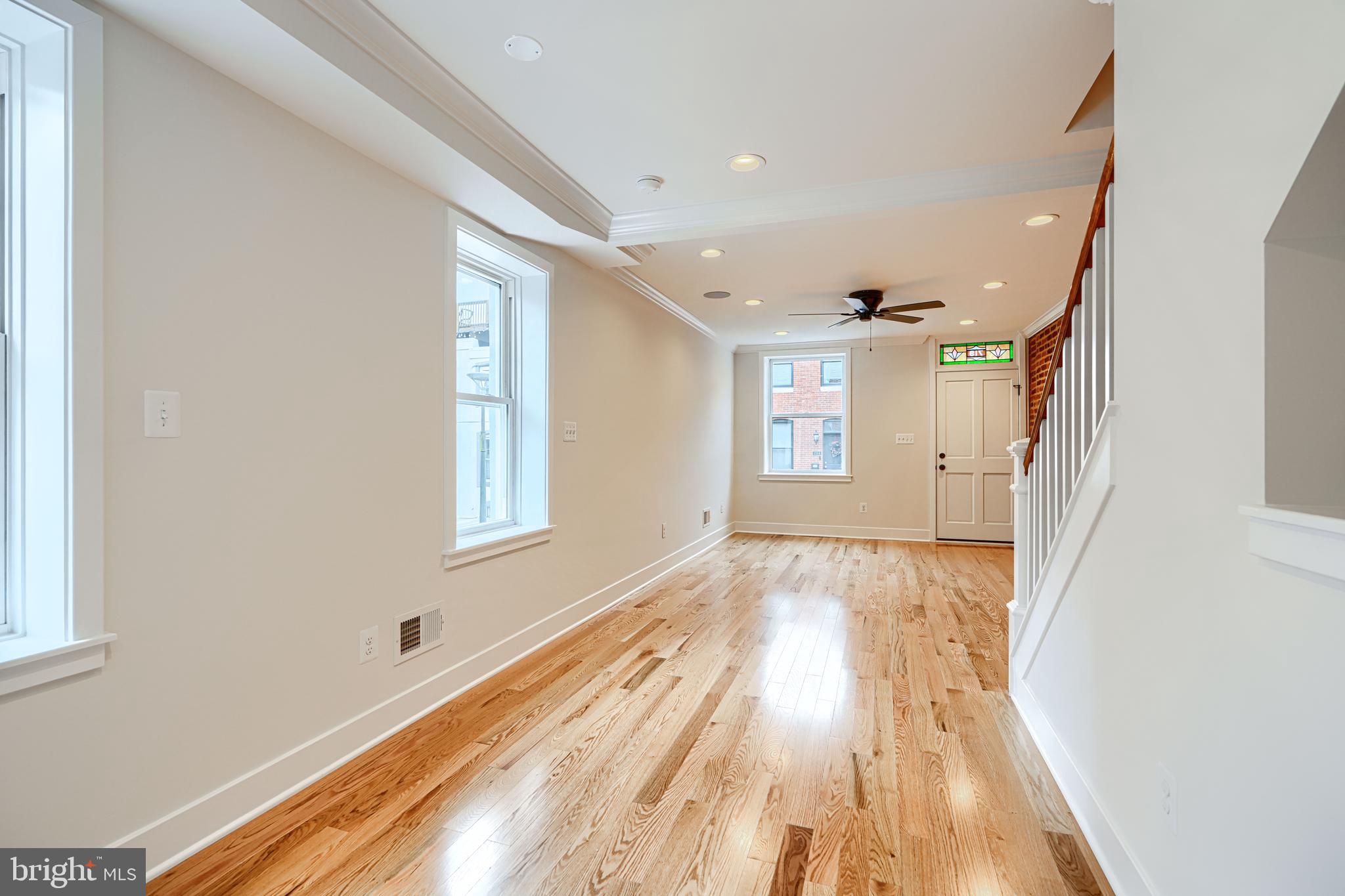 719 South Robinson Street Baltimore, MD 21224 - Photo 8 of 31 a view of an empty room and window