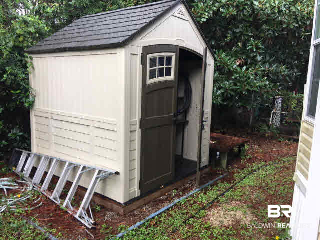 155 Defuniak Loop Lillian, AL 36549 - Photo 8 of 12 Storage shed.