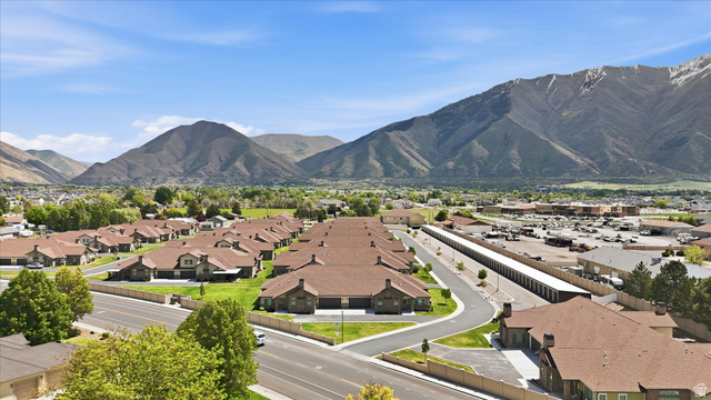 1838 West 300th Street South, Unit B Mapleton, UT 84664 - Photo 41 of 51 Residential development featuring multi-unit buildings with brown roofs and stone accents