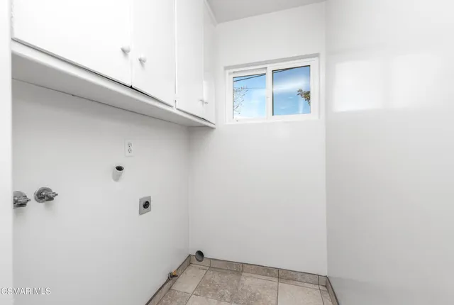 a bathroom with a sink toilet and mirror