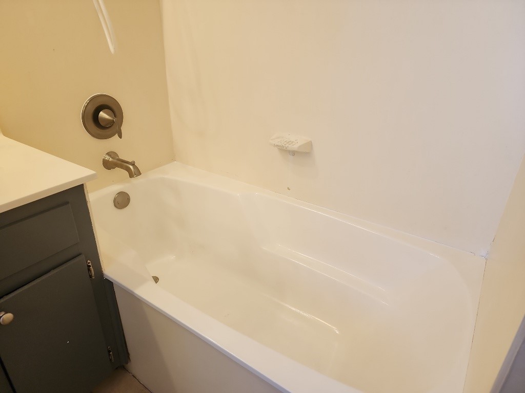 807 Country Club Road Georgetown, TX 78628 - Photo 31 of 31 Bathroom featuring vanity and shower / bathtub combination