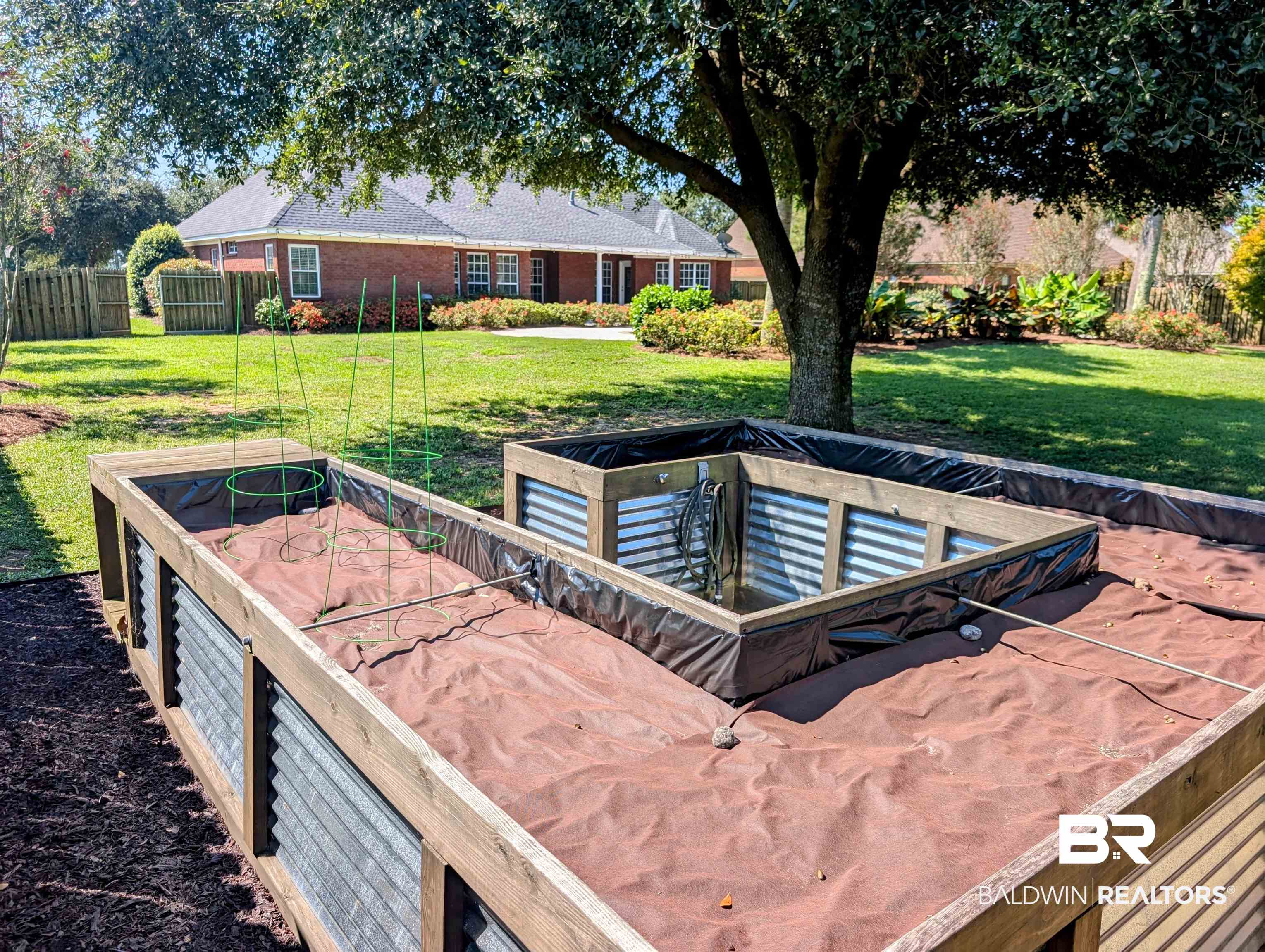 11623 Halcyon Loop Daphne, AL 36526 - Photo 71 of 90 A custom made raised bed for those with a green thumb looking to grow their own vegetables, herbs, or fruits at home