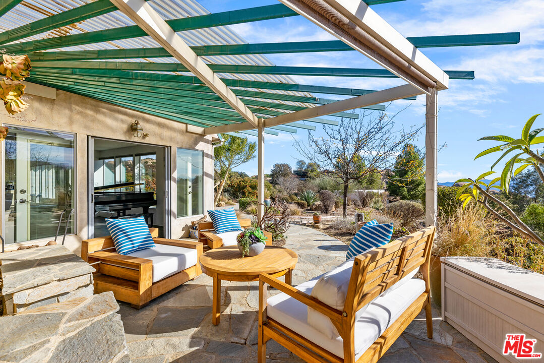 7401 Studio Road West Hills, CA 91304 - Photo 6 of 18 a outdoor space with patio lots of furniture