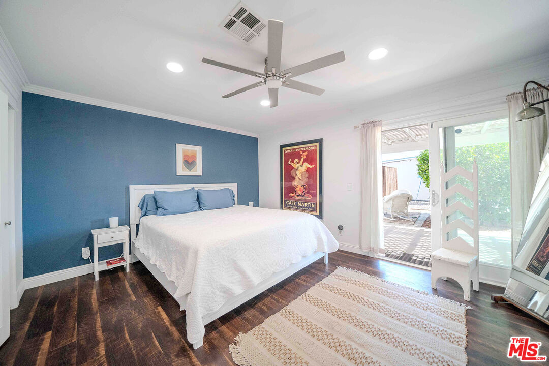 9524 Santa Cruz Road Desert Hot Springs, CA 92240 - Photo 22 of 53 a bed room with a bed and a large window