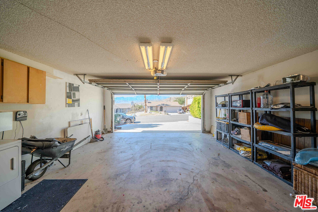 9524 Santa Cruz Road Desert Hot Springs, CA 92240 - Photo 43 of 53 a view of a livingroom with furniture and a window