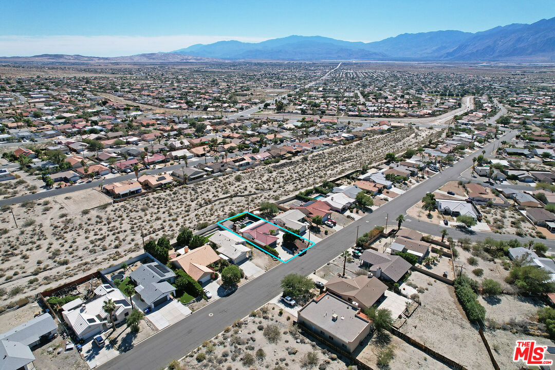 9524 Santa Cruz Road Desert Hot Springs, CA 92240 - Photo 52 of 53 an aerial view of a city with lots of residential buildings