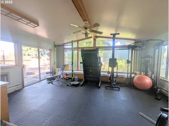 a view of a backyard with a sitting area