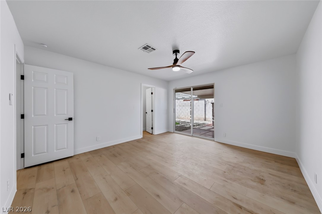 434 Crestway Road Henderson, NV 89015 - Photo 23 of 46 Unfurnished room featuring light wood finished floors and ceiling fan
