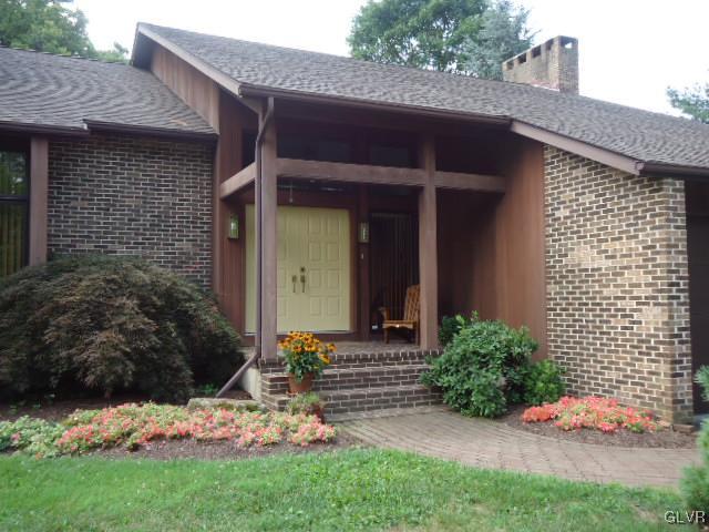 3668 Ritter Road Allentown, PA 18104 - Photo 21 of 36 a front view of a house with a yard