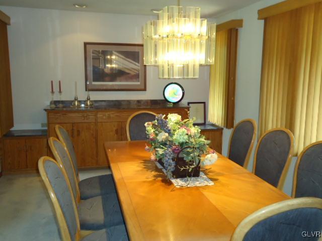3668 Ritter Road Allentown, PA 18104 - Photo 25 of 36 a dining room with furniture and chandelier