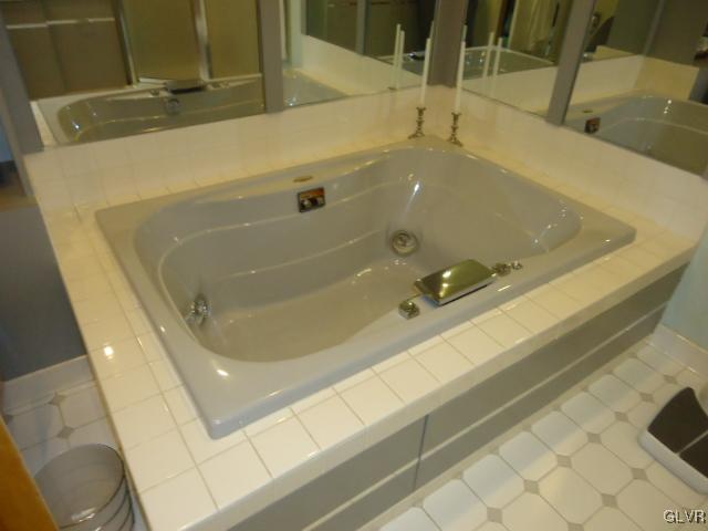 3668 Ritter Road Allentown, PA 18104 - Photo 31 of 36 a bathroom with a tub