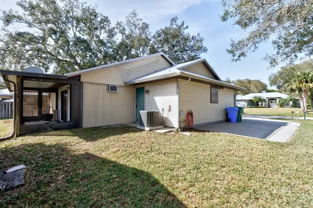 a house with trees in the background