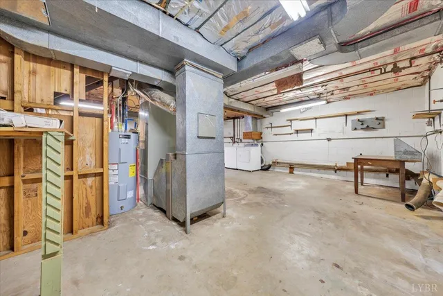 a view of a house with snow on the road