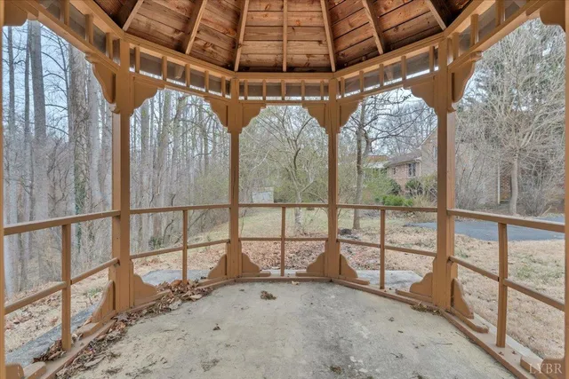 a view of a wooden floor and a lake view
