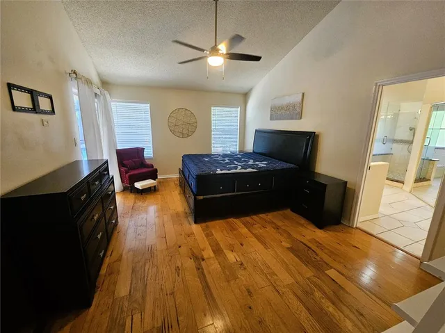 a kitchen with a stove and a refrigerator