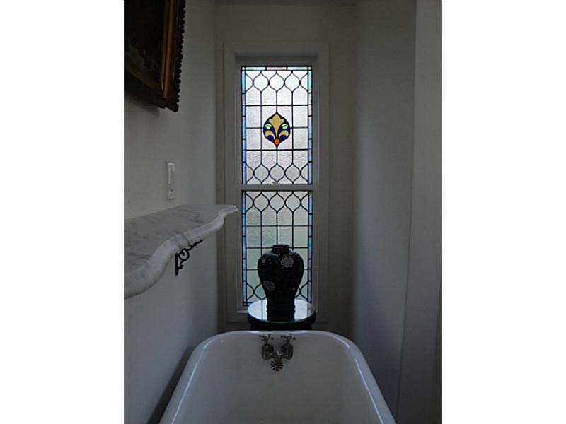 18 Balcom Road Foster, RI 02825 - Photo 15 of 25 Bathroom. Stained glass, Rod Iron and marble, period moldings and tub and a stand up shower in your master bathroom