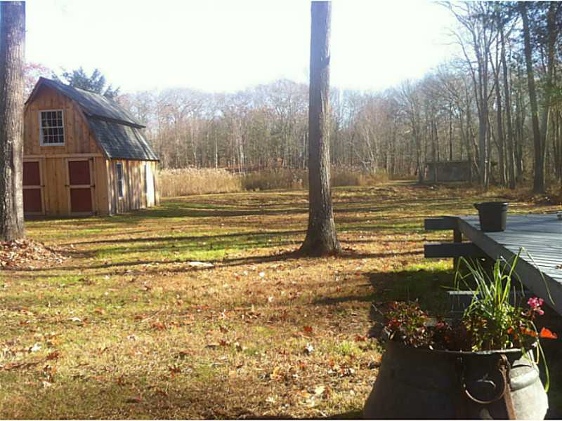 18 Balcom Road Foster, RI 02825 - Photo 24 of 25 Land/Lot. Views of your well placed outbuildings and a bass pond from your deck