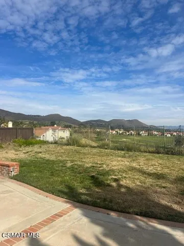 a view of a lake with a mountain