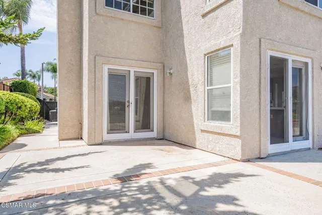 a house view with a backyard space