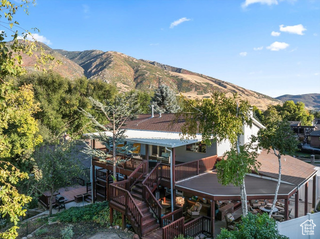 1663 Hidden Valley Club Drive Sandy, UT 84092 - Photo 1 of 1 Aerial photo of back of house & decks near mountains.