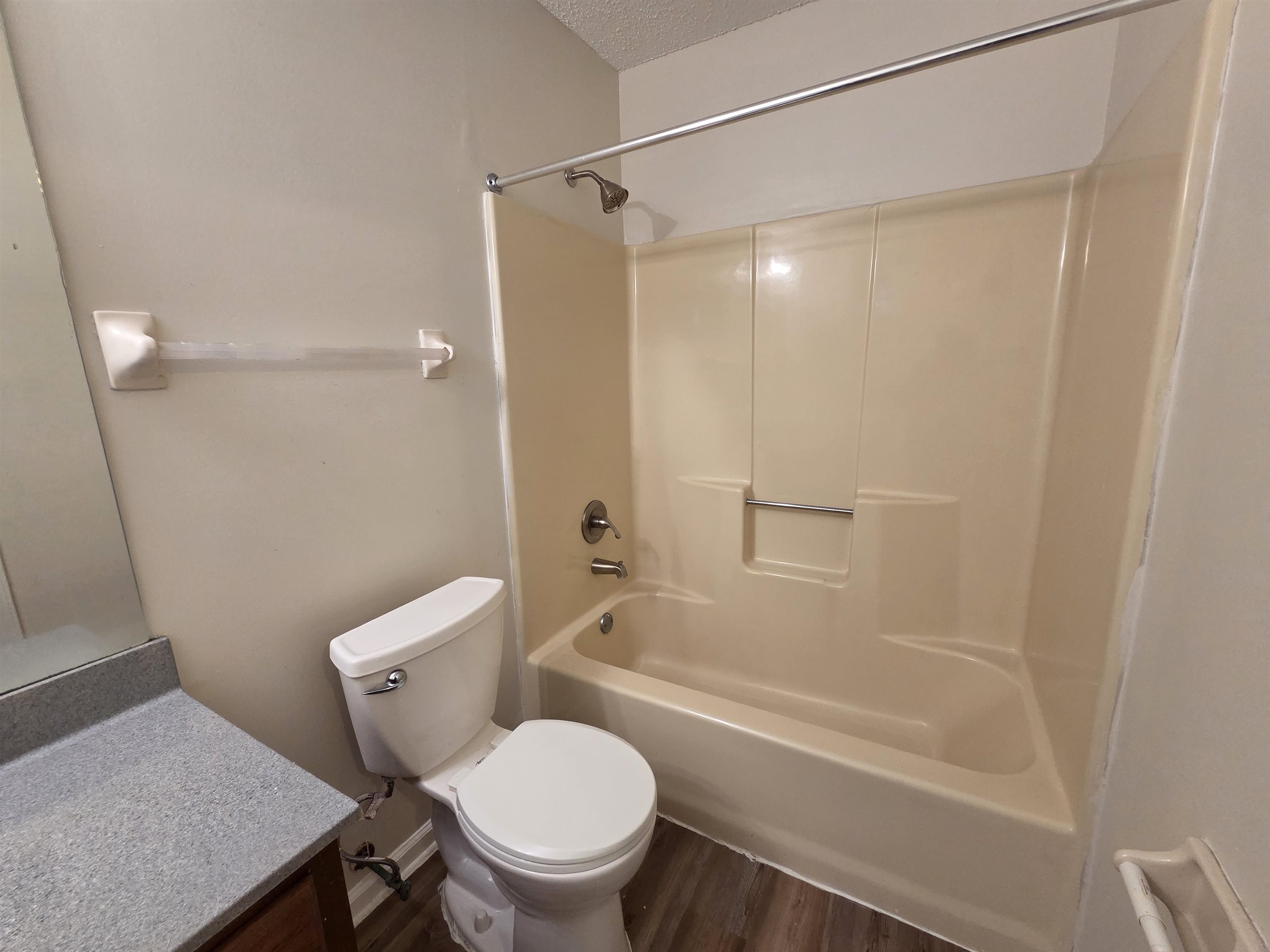 3945 Oak Branch Circle East Memphis, TN 38135 - Photo 23 of 24 a white toilet sitting next to a bath tub
