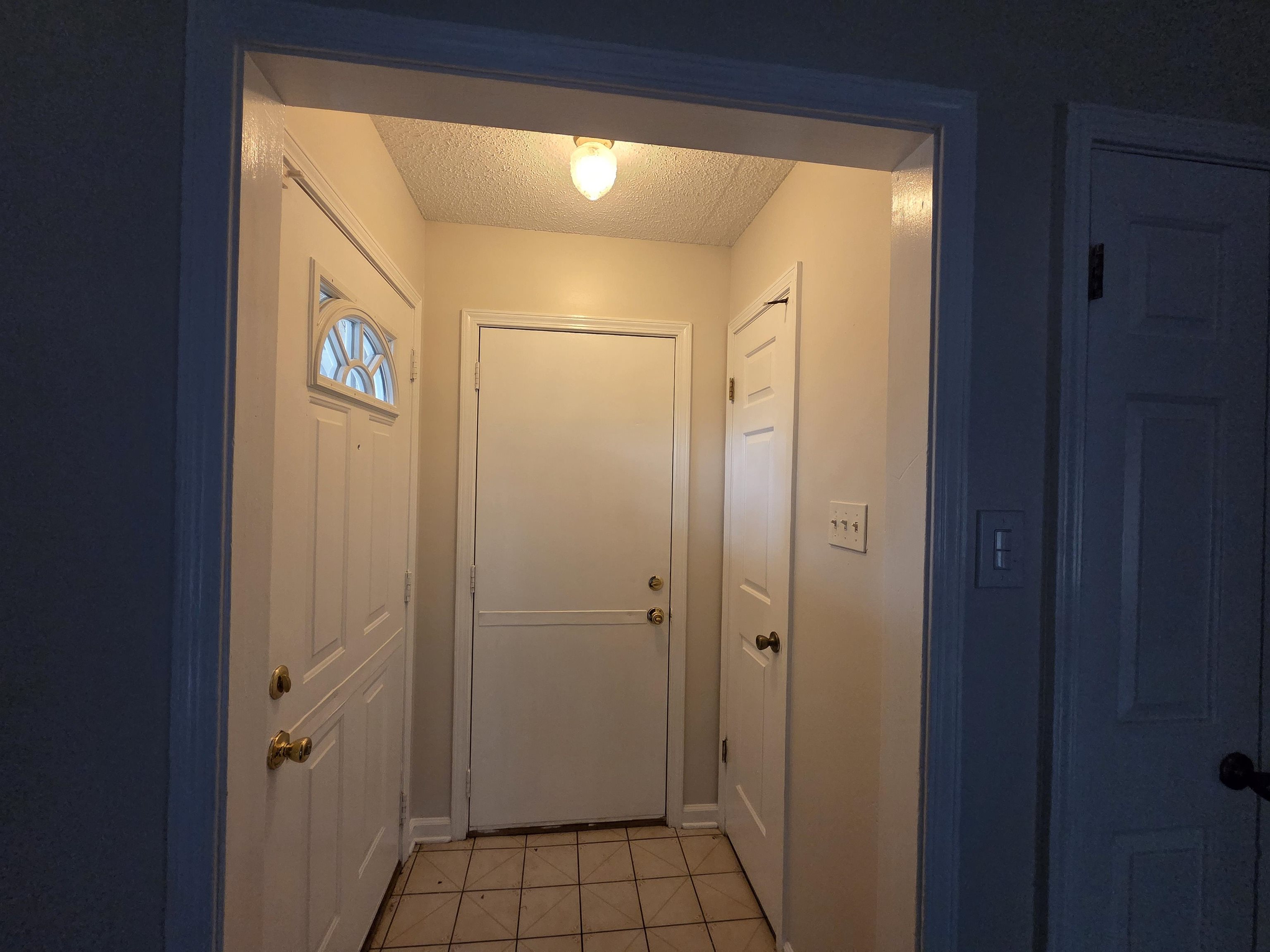 3945 Oak Branch Circle East Memphis, TN 38135 - Photo 9 of 24 a bathroom with a glass shower door