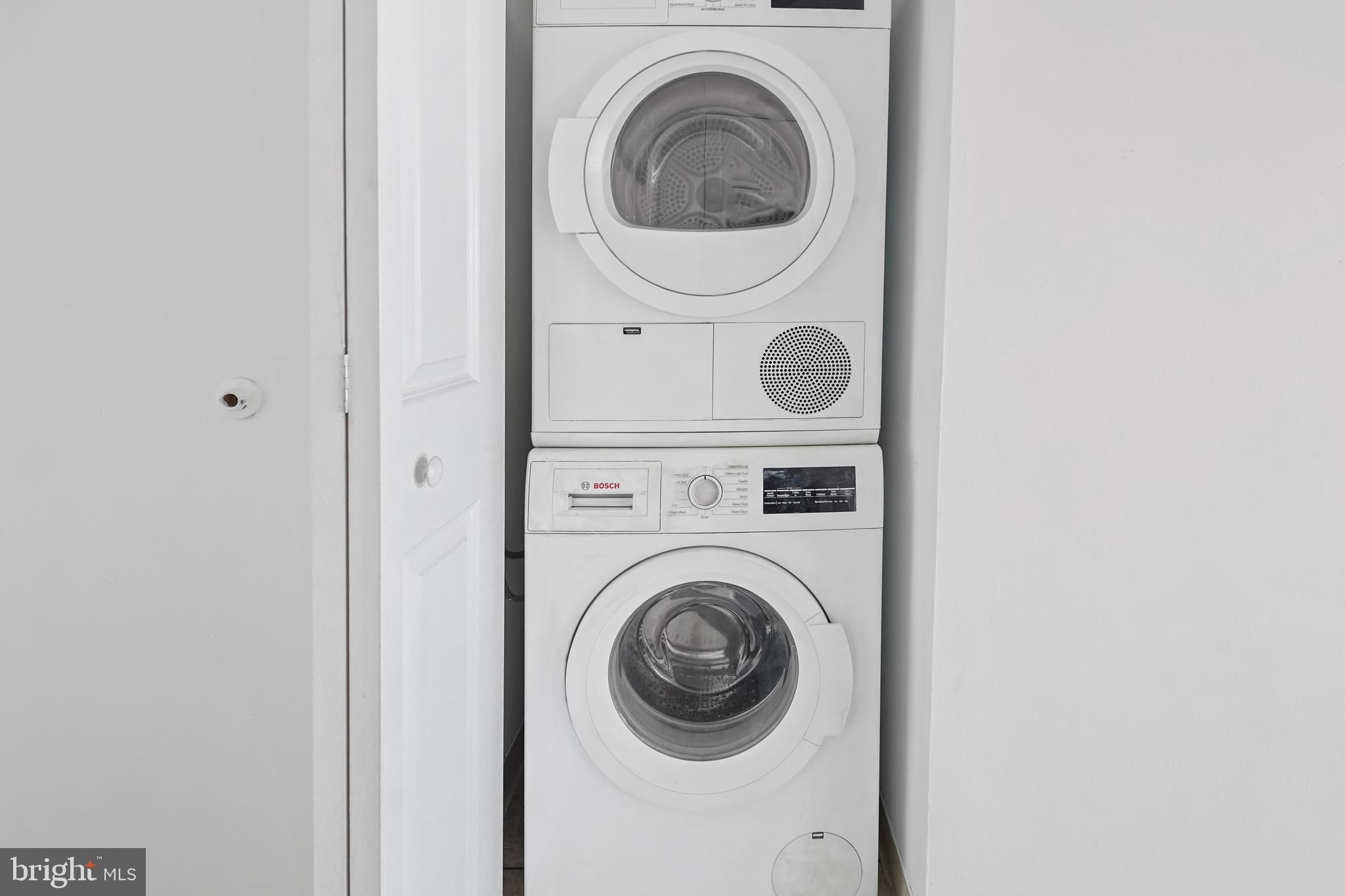 5000 Battery Lane, Unit 501 Bethesda, MD 20814 - Photo 16 of 21 a utility room with dryer and washer