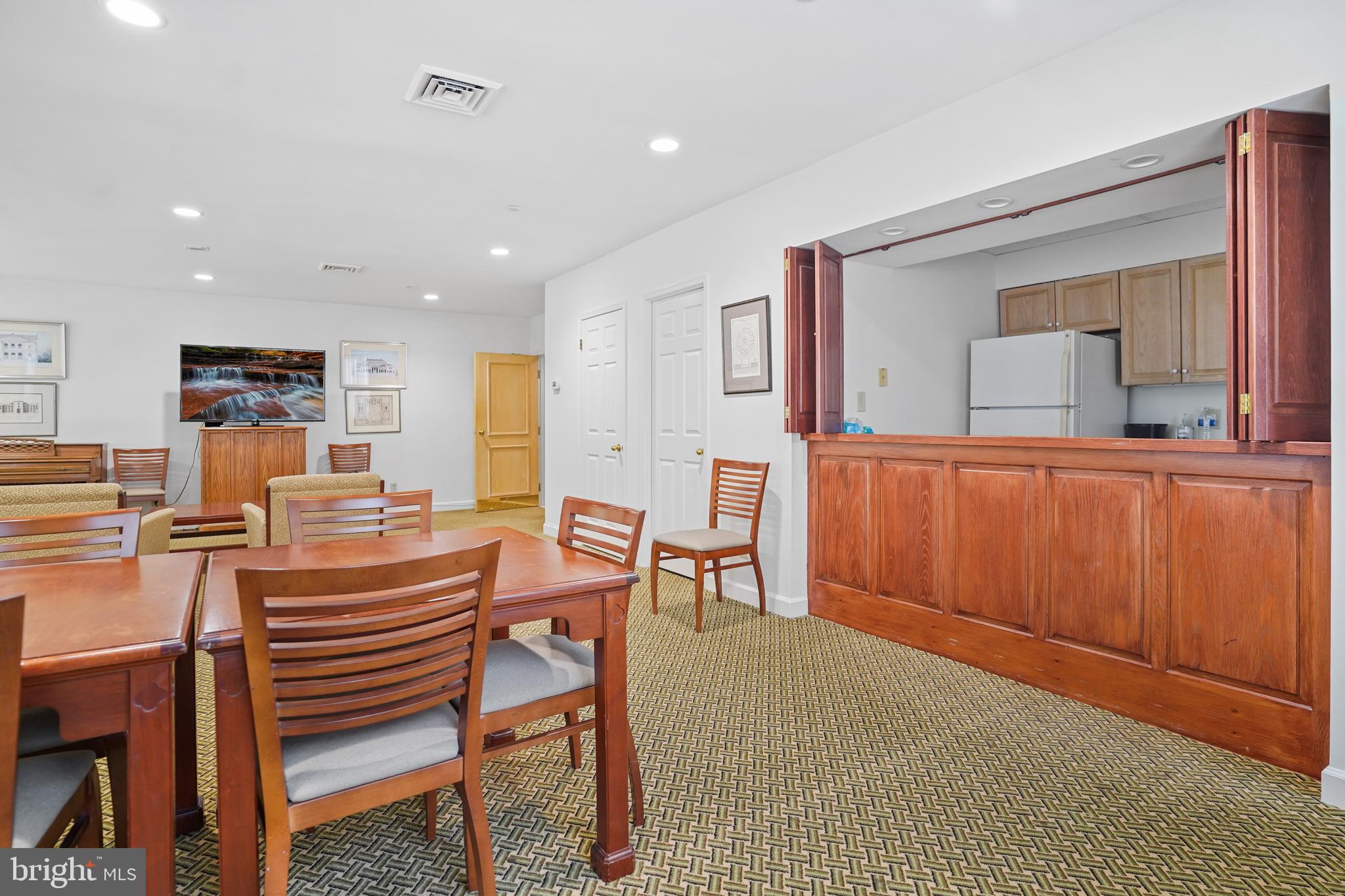 5000 Battery Lane, Unit 501 Bethesda, MD 20814 - Photo 20 of 21 a view of a dining room with furniture