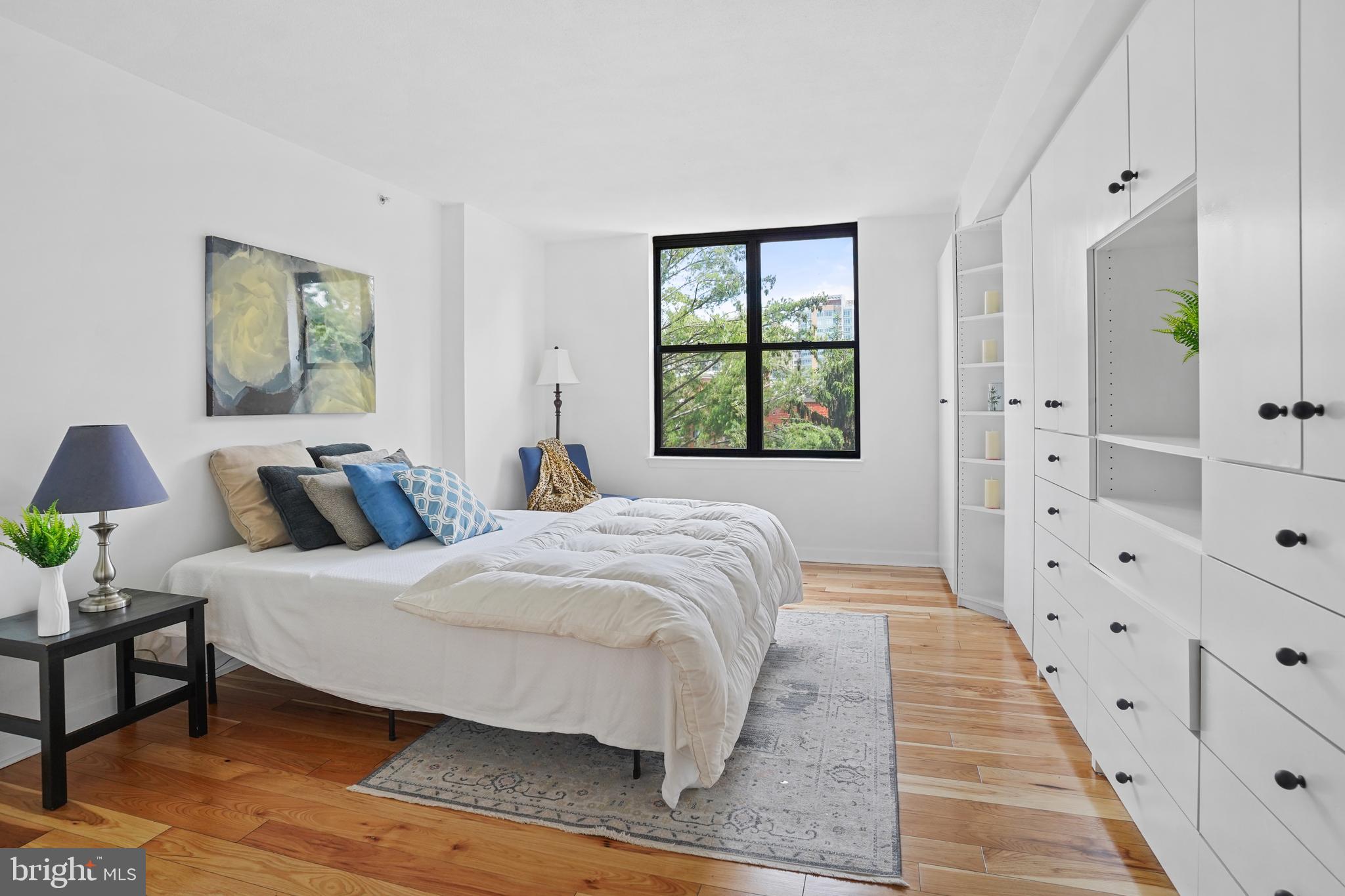 5000 Battery Lane, Unit 501 Bethesda, MD 20814 - Photo 6 of 21 a spacious bedroom with a bed and window