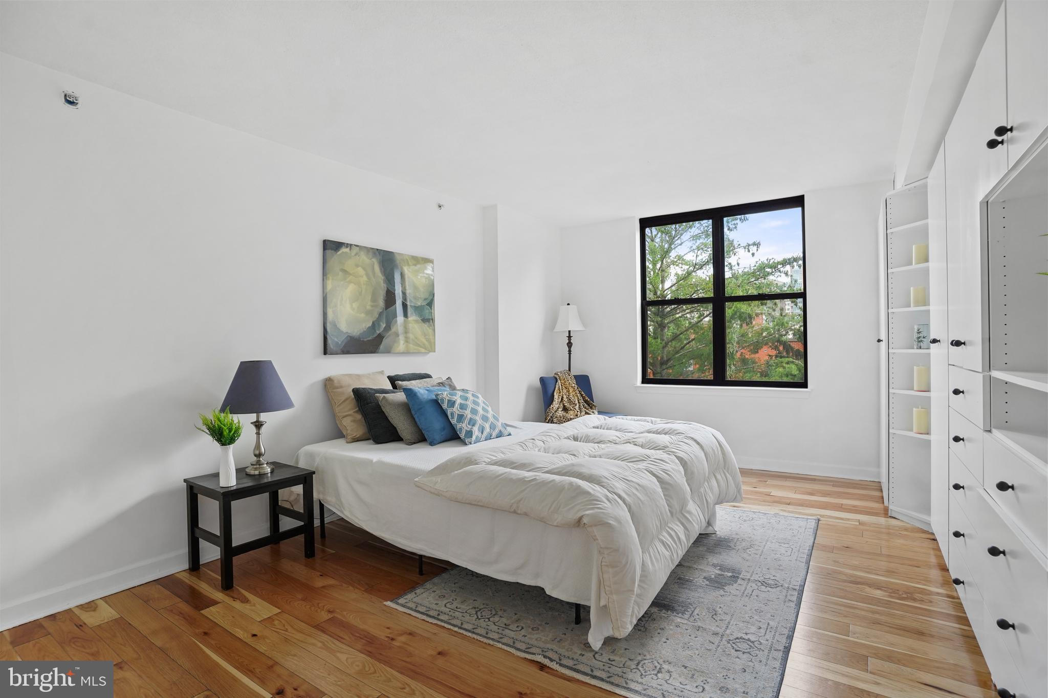 5000 Battery Lane, Unit 501 Bethesda, MD 20814 - Photo 8 of 21 a bedroom with a bed and window