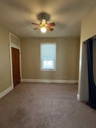 an empty room with window