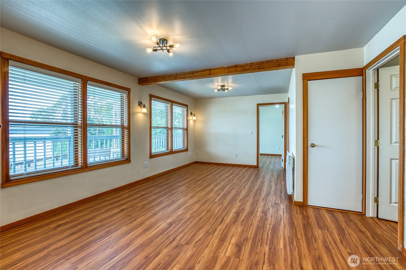 942 Deer Harbor Road Orcas Island, WA 98245 - Photo 10 of 40 a view of empty room with wooden floor and fan