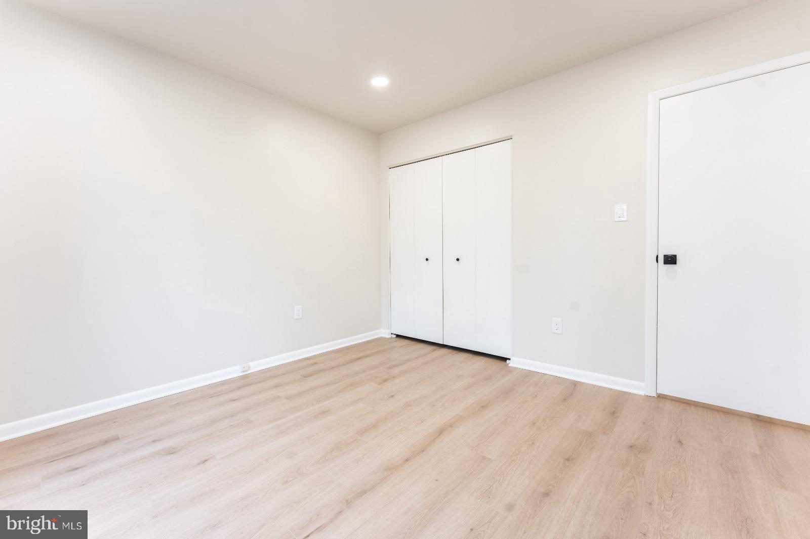 6350 Red Cedar Place, Unit 309 Baltimore, MD 21209 - Photo 25 of 29 a view of an empty room