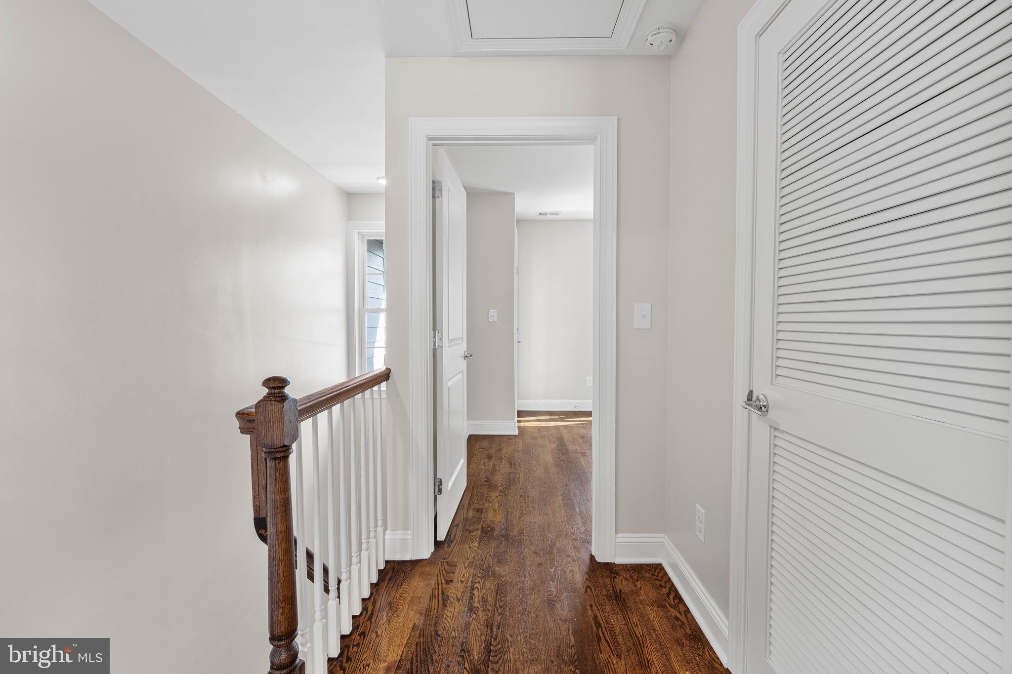 303 # 2 Witherspoon Street Princeton, NJ 08542 - Photo 16 of 31 a view of a hallway with wooden floor and closet