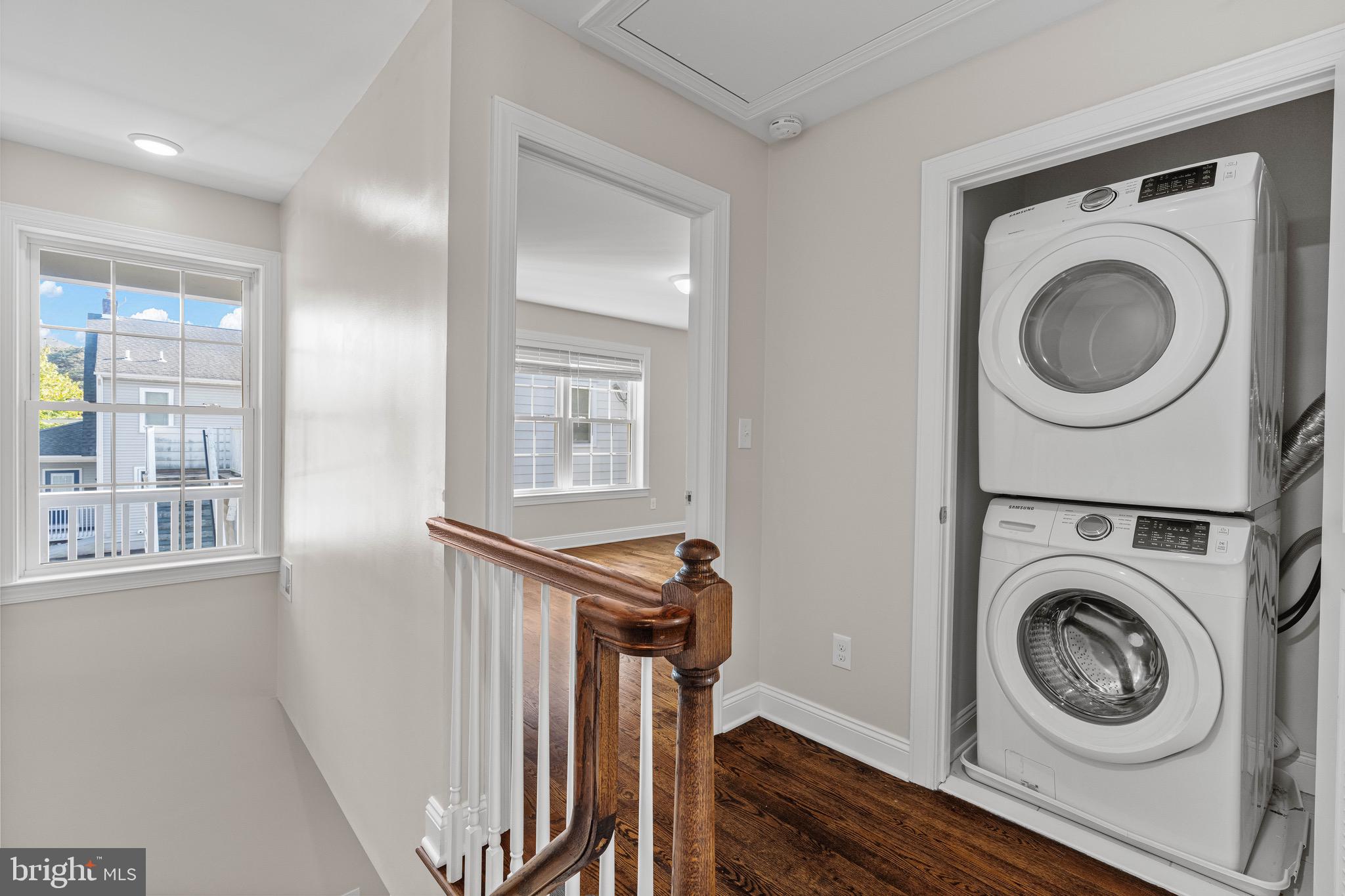 303 # 2 Witherspoon Street Princeton, NJ 08542 - Photo 17 of 31 a view of a hallway with washer and dryer