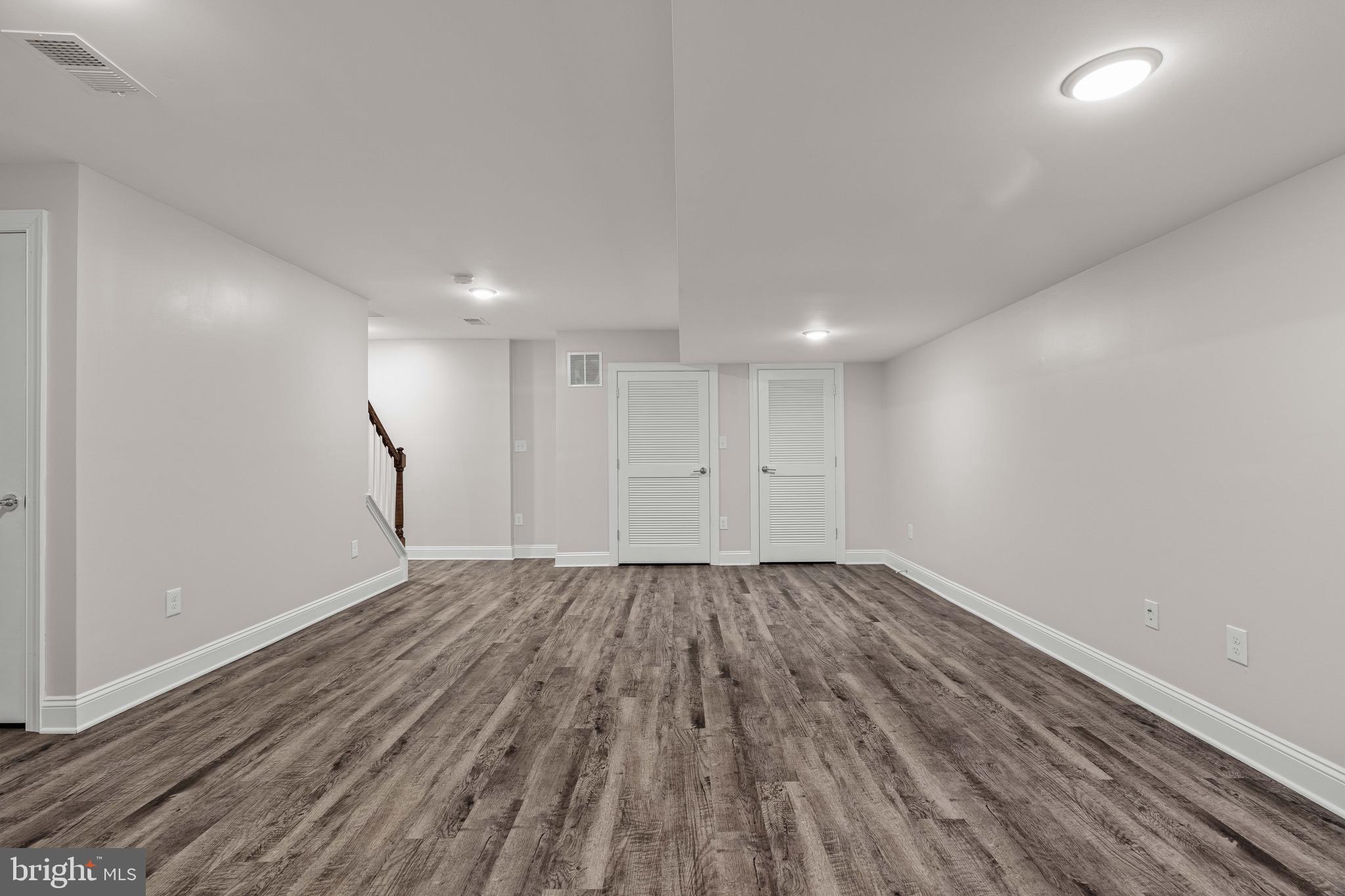 303 # 2 Witherspoon Street Princeton, NJ 08542 - Photo 25 of 31 a view of an empty room with wooden floor