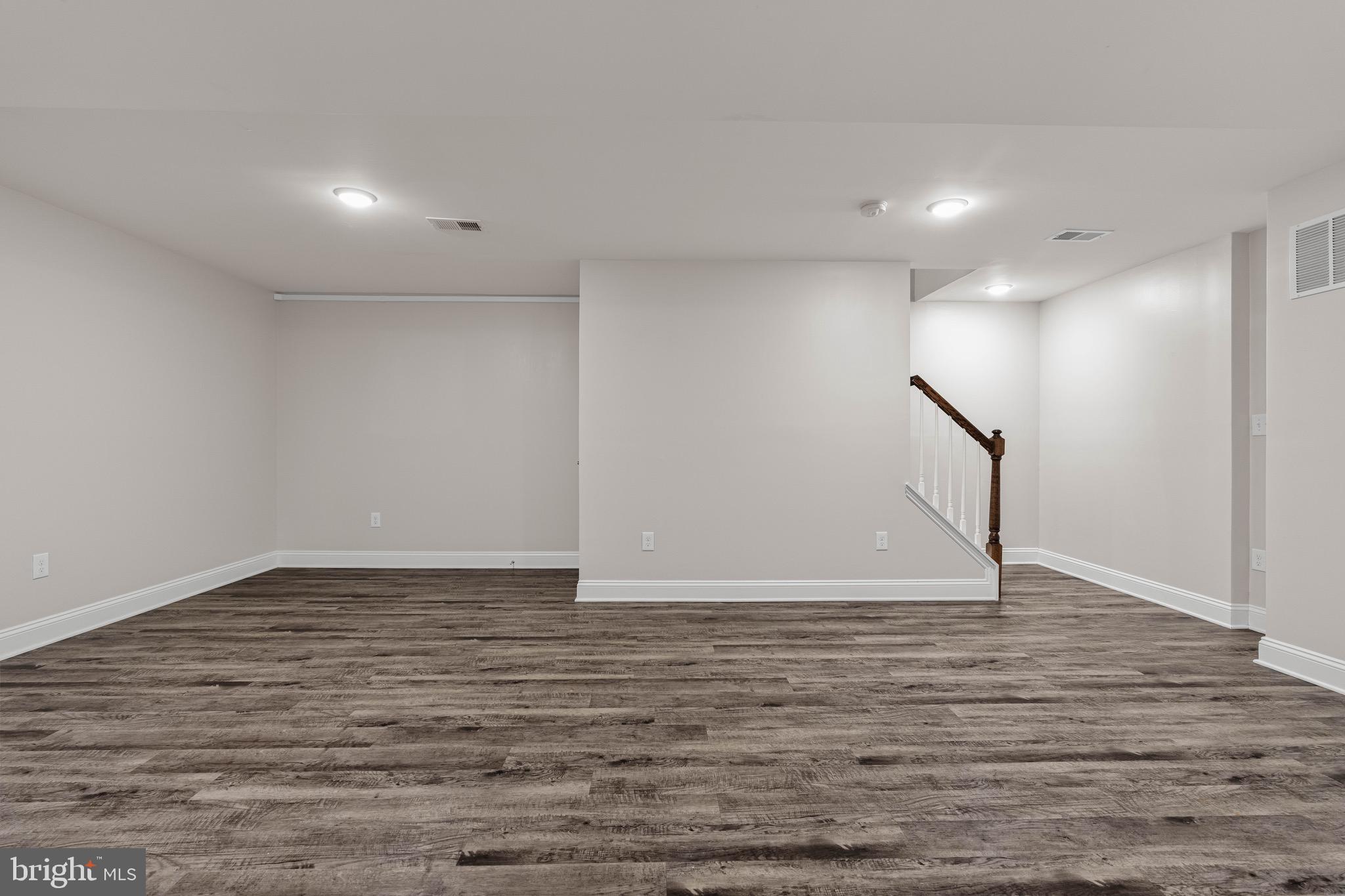 303 # 2 Witherspoon Street Princeton, NJ 08542 - Photo 27 of 31 a view of an empty room with wooden floor